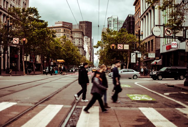 people crossing the road on the crosswalk - Stockton Pedestrian Accident Lawyers