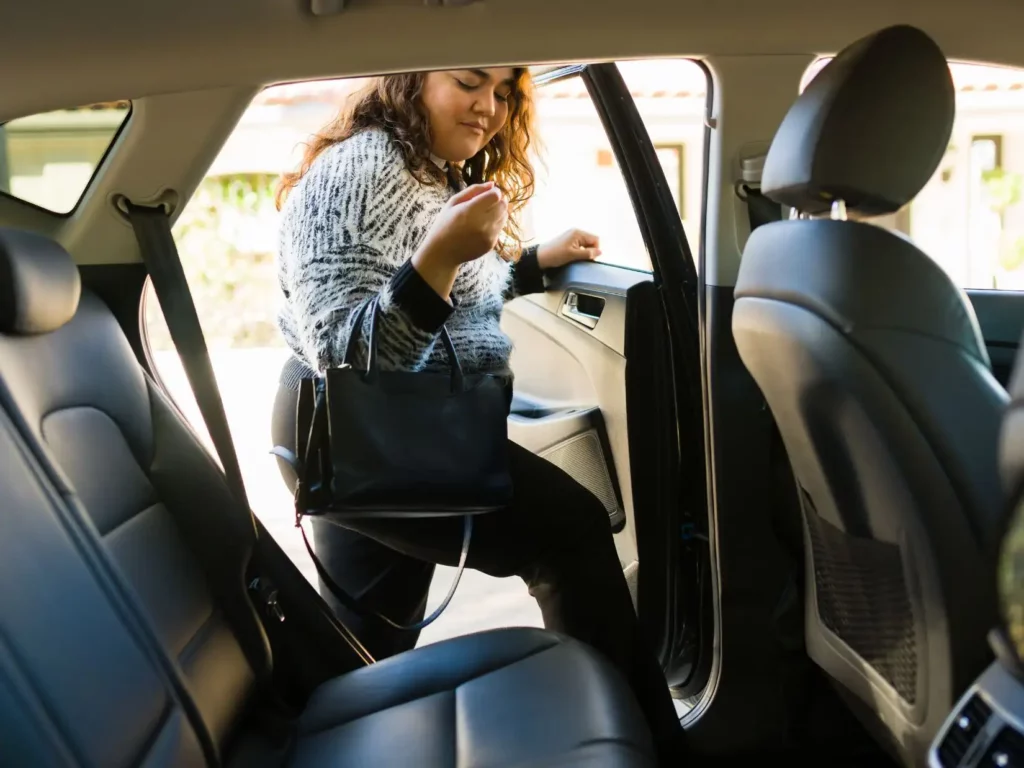 woman getting in a car - Chandler Rideshare Accident Lawyers
